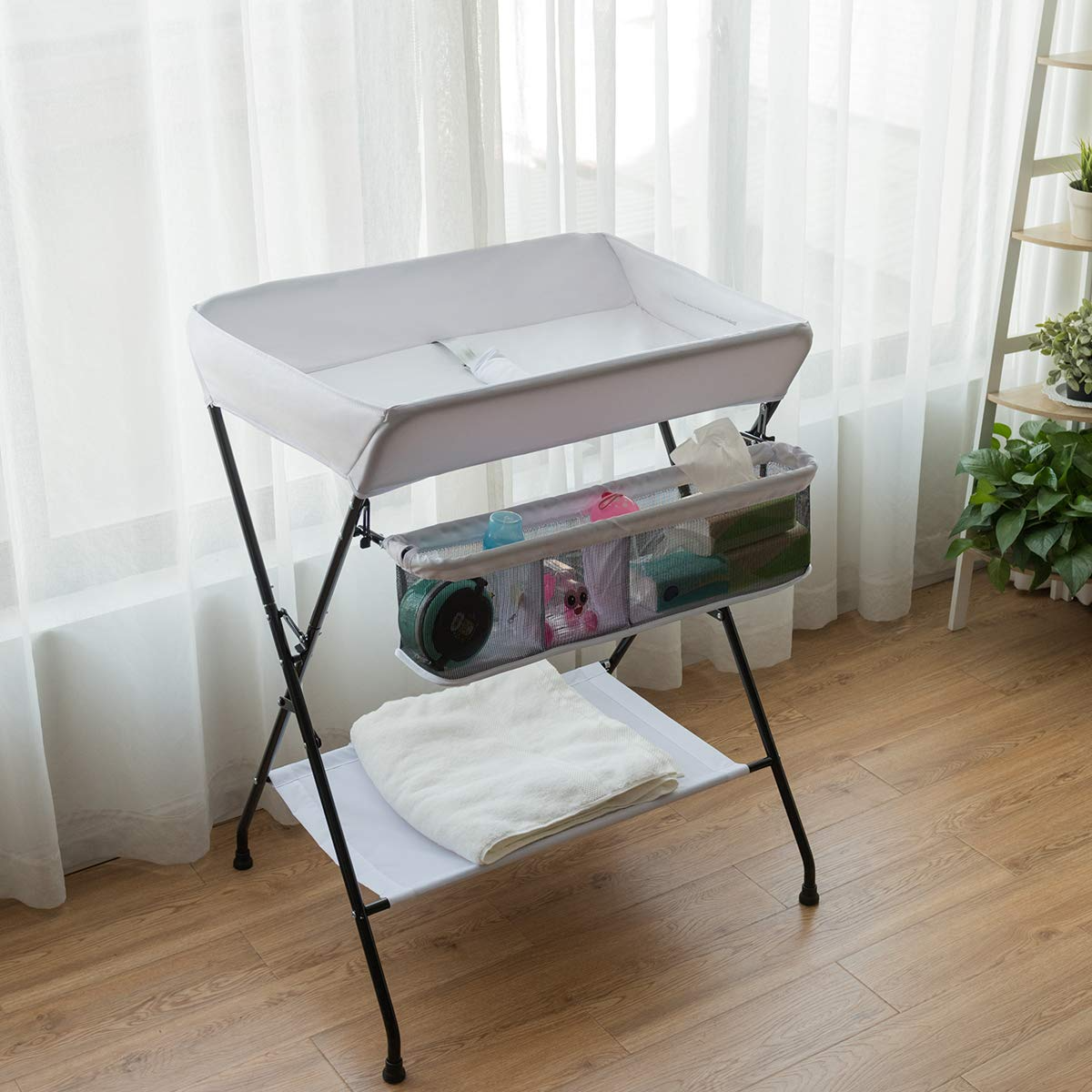 Collapsible baby top changing table